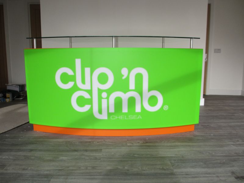 Clip N Climb front desk signage